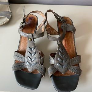 Clarks “indigo” leather sandals.